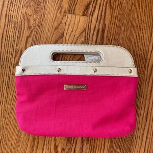 Carrie Dunham clutch, gold with pink and black covers.